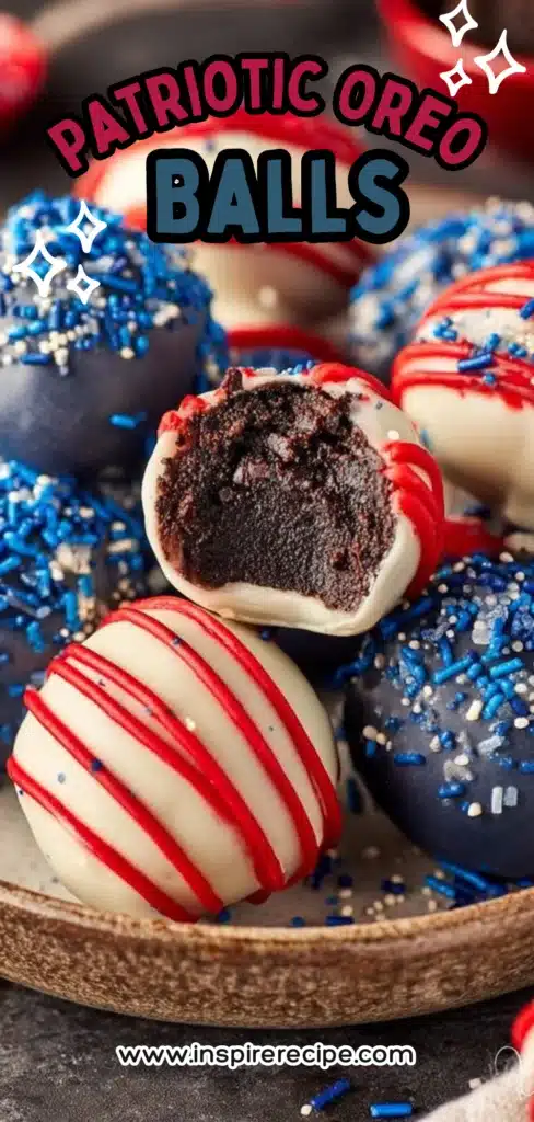 Oreo truffles coated in white and dark chocolate with red drizzle and blue sprinkles, one with a bite showing fudgy center