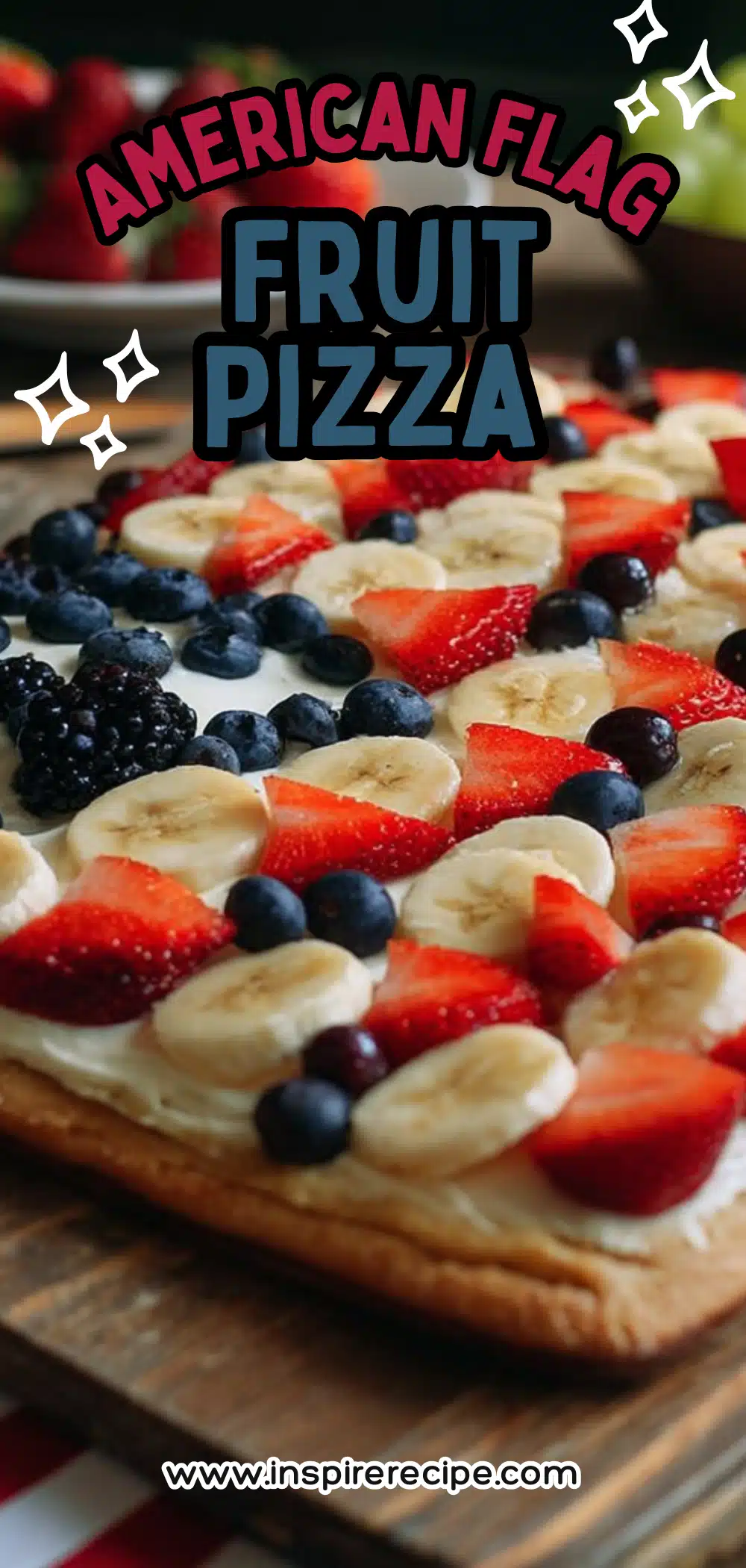 Fruit pizza with bananas, strawberries, blueberries, and blackberries arranged like the American flag.