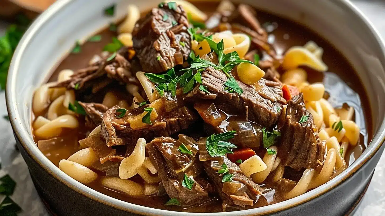 Delicious slow cooker beef and noodles in a savory broth