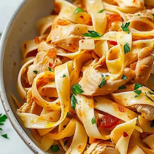 Delicious Beshbarmak chicken pasta dish served on a plate