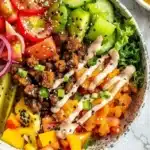 Delicious Burger Bowl filled with fresh ingredients and toppings.