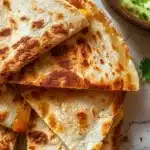 Delicious cheese quesadillas grilled to perfection with melted cheese and crispy tortilla