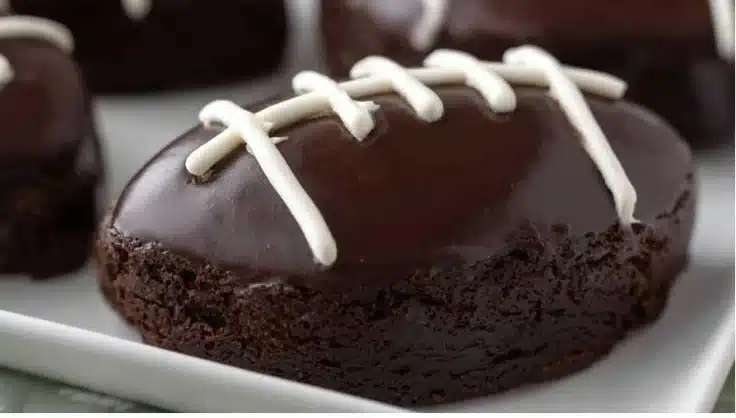 Decadent football brownies decorated for game day fun.