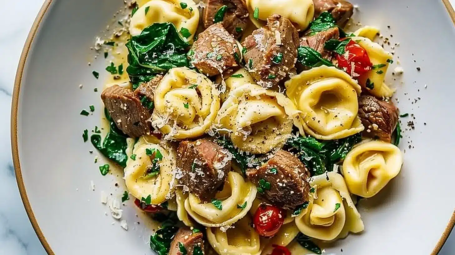 Delicious Garlic Steak Tortellini with Spinach served in a bowl