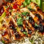 Delicious Honey Lime Chicken Bowl with fresh ingredients and vibrant garnishes