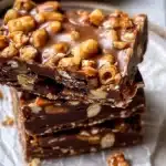 No bake crispy Snickers bars with chocolate and peanuts
