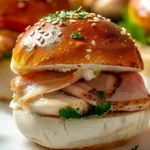 Turkey and Swiss Sliders served on a platter with fresh toppings and sides.