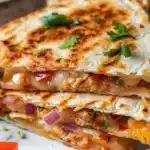 Quick air fryer quesadilla ready to serve with melted cheese and crispy edges