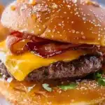 Buttery glazed donut burger topped with savory ingredients and melted cheese.