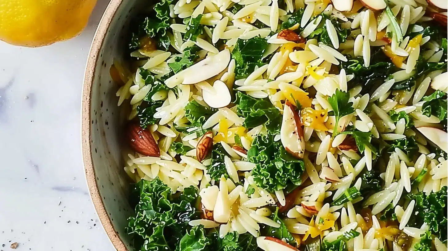 Orzo kale salad served with lemon vinaigrette and fresh ingredients