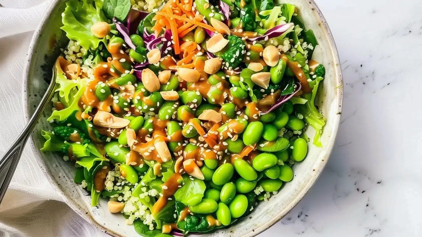 Vegan Edamame Salad topped with ginger-peanut dressing and colorful vegetables